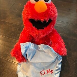 Red Elmo Plush Toy with Blue Blanket
